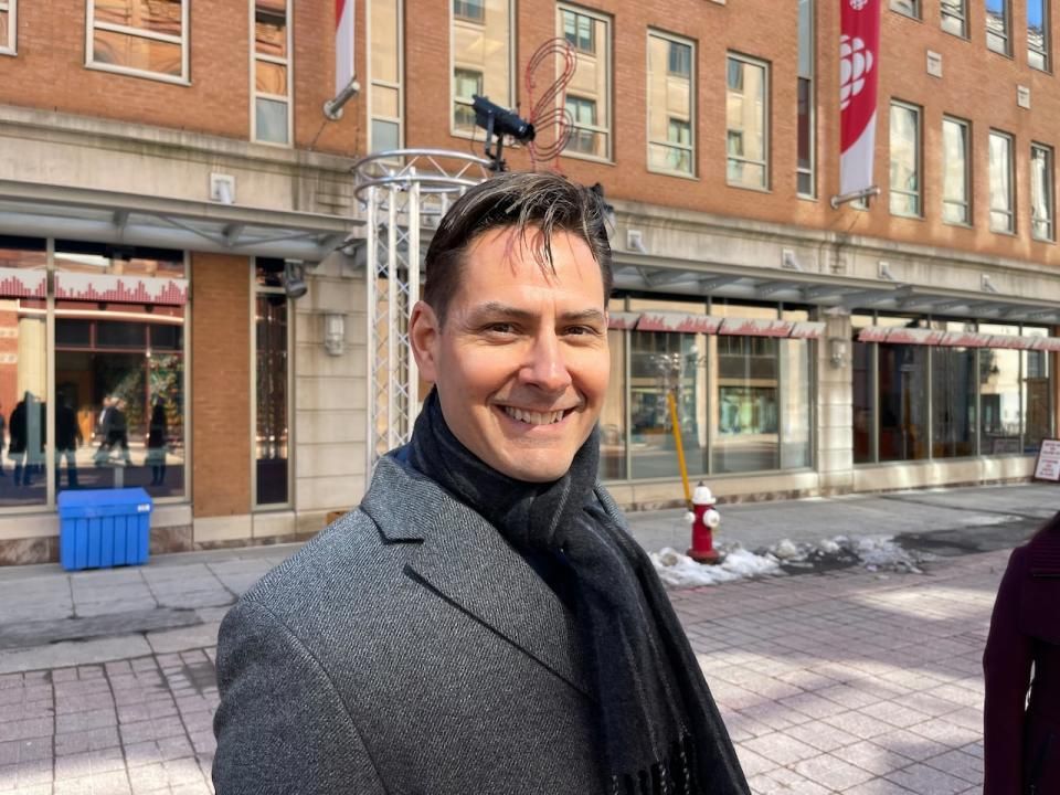 Michael Kovrig walks down Sparks Street in Ottawa ahead of U.S. President Joe Biden's address to Parliament on March 24, 2023. Kovrig has written a letter in support of Cameron Ortis. (Chris Rands/CBC - image credit)