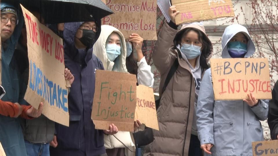Hundreds of people, many of whom were international students, protested at the Vancouver Art Gallery on a rainy Saturday as B.C. announced updated guidelines for its provincial nominee program (PNP). (Sohrab Sandhu/CBC - image credit)