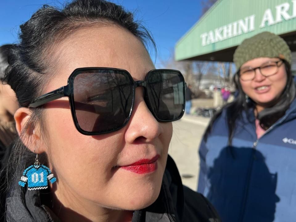 Star Ruben, who attended the Yukon Native Hockey tournament for her first time, made custom beaded hockey jersey earrings in the team colours of her community, Paulatuk, N.W.T.