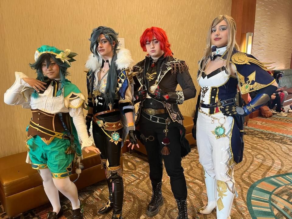 Hunter Bryden, second from right, dressed as Diluc from Genshin Impact.
