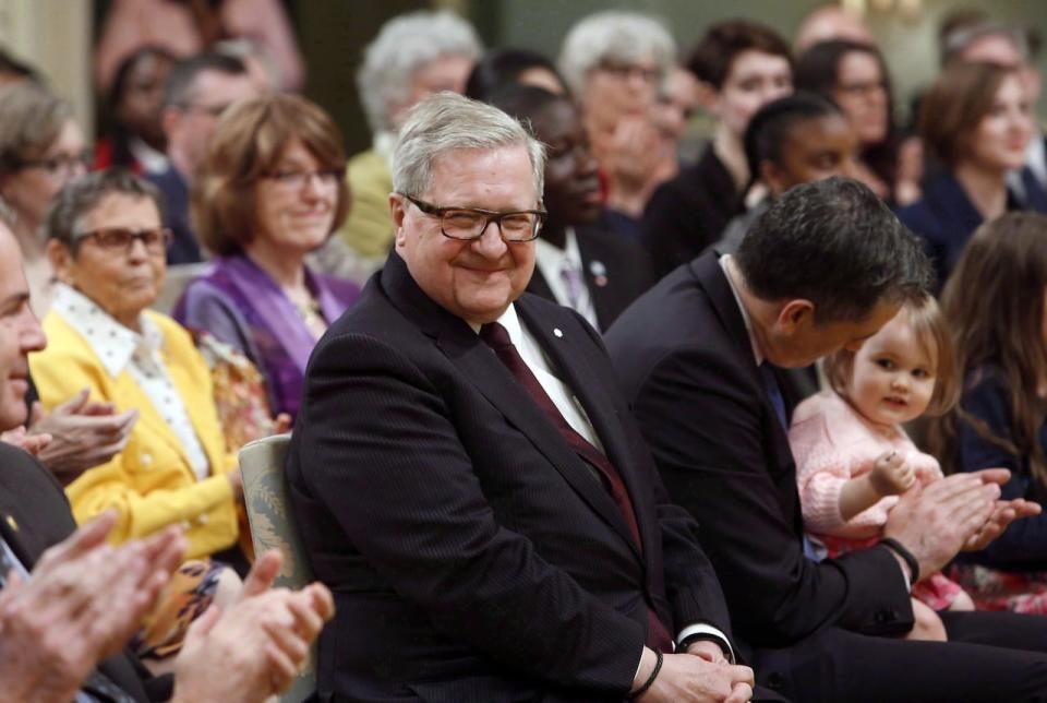 Former Liberal cabinet minister Lloyd Axworthy (left) looks on before being presented with the 30th Pearson Peace Medal during a ceremony at Rideau Hall in Ottawa on Wednesday, May 24, 2017. Myanmar's military elite need to have their wings clipped by targeted United Nations travel sanctions to press them to stop the ethnic cleansing of Rohingya Muslims, says former foreign affairs minister Axworthy.