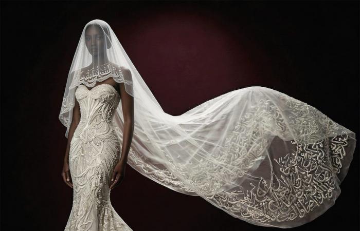 "عشق أبدي".. مصمم تونسي يطرّز اللغة العربية على فساتين زفافه